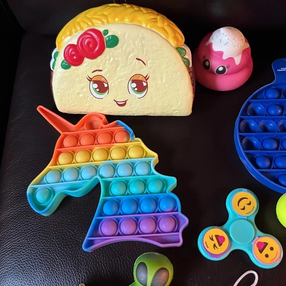 Bundle of squishies and Fidget and Animal Figures.